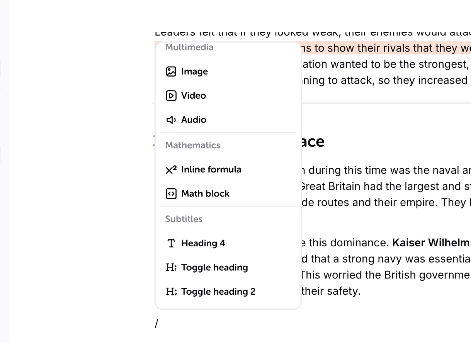 Typing "/" while editing opens the insert menu: multimedia (image, video, audio), mathematics (inline formula, math block) and subtitles.
